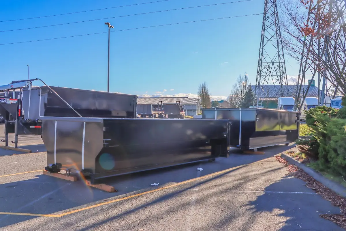 Roll-off dumpster ready for waste disposal at job site for 2 Yard Dumpster Rental in Woodcliff Lake